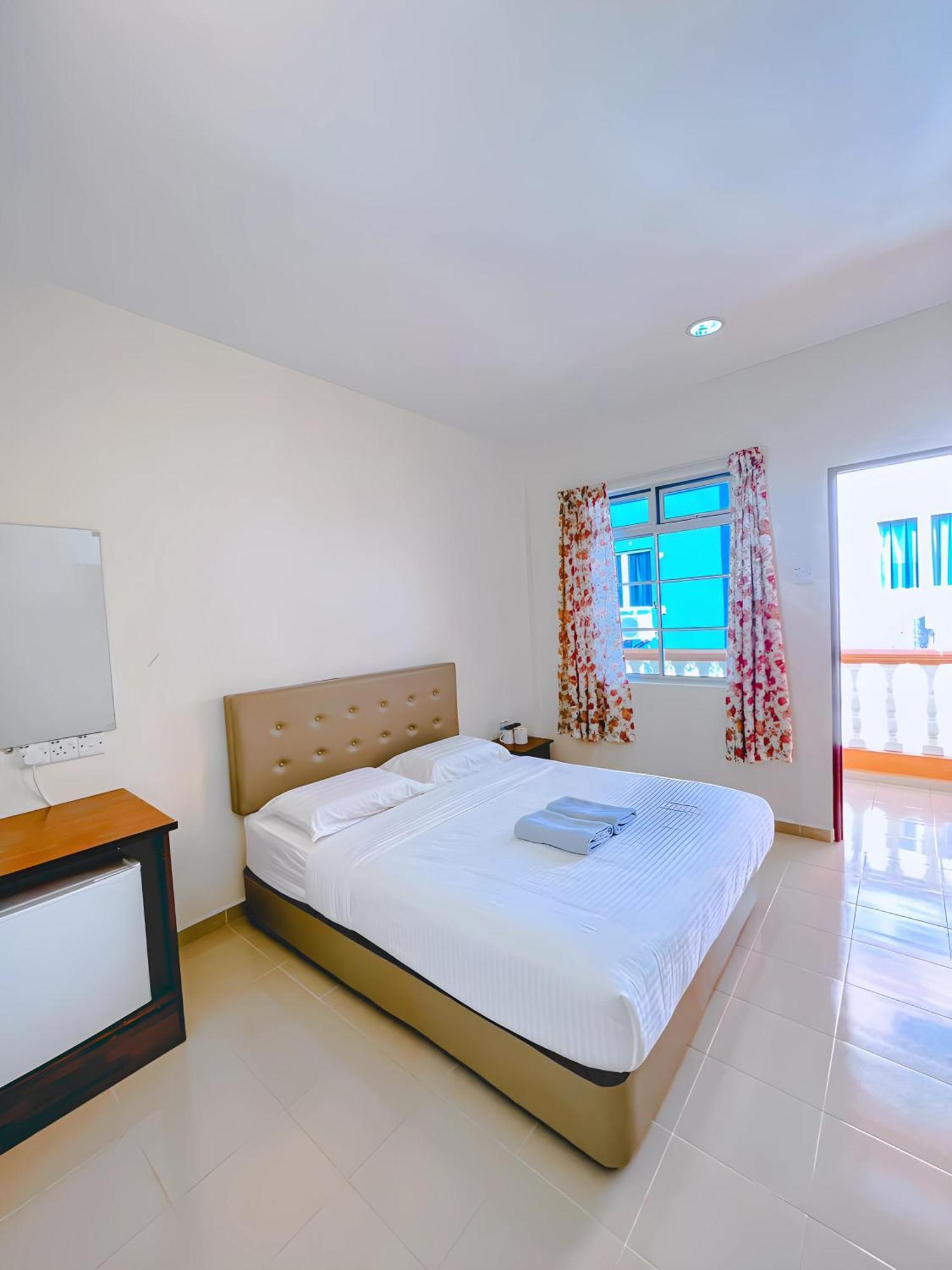 Amzar Motel Cenang 珍南海滩 外观 照片